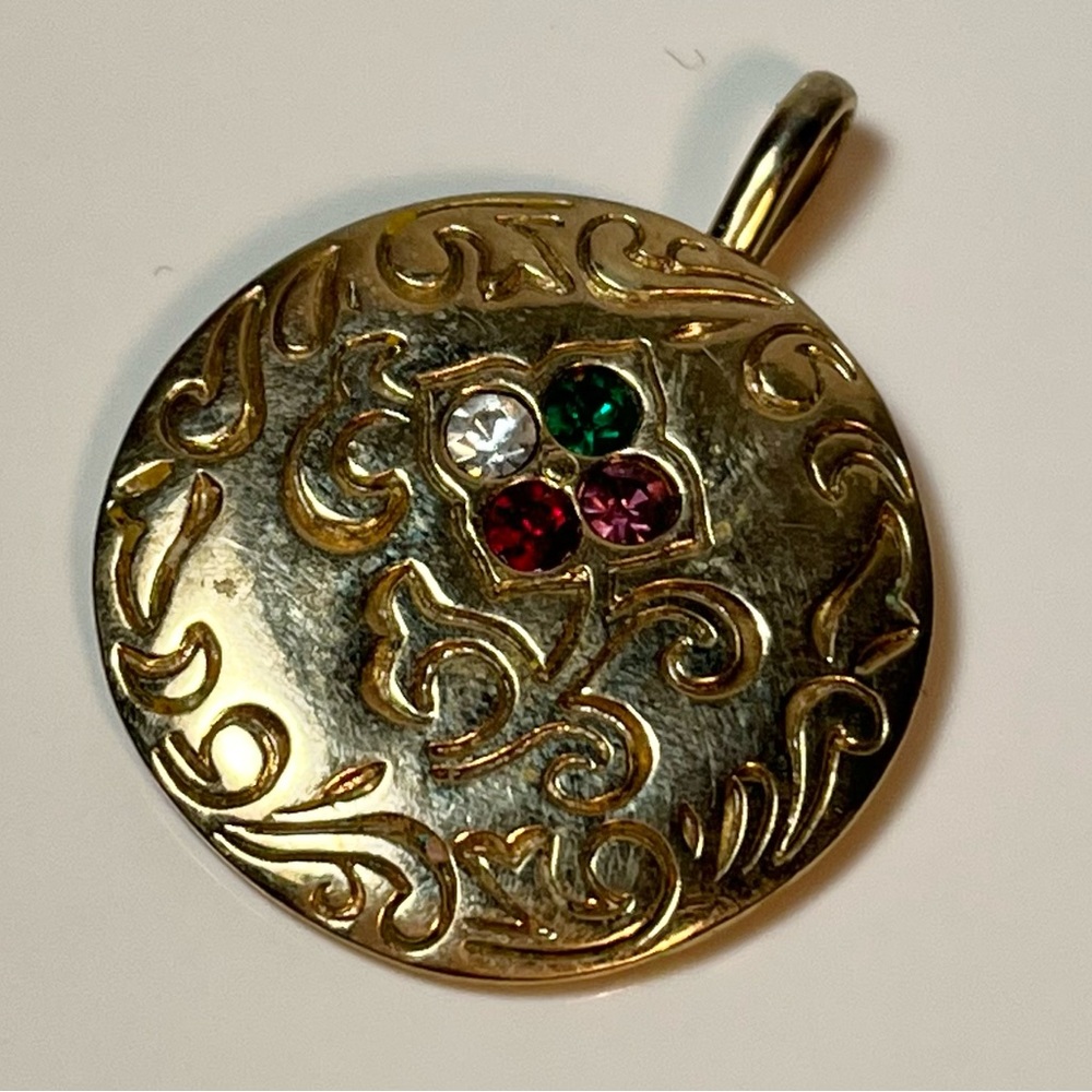 Vintage 1 1/8” goldtone pendant w/ “dear” on back and 4 stones in front